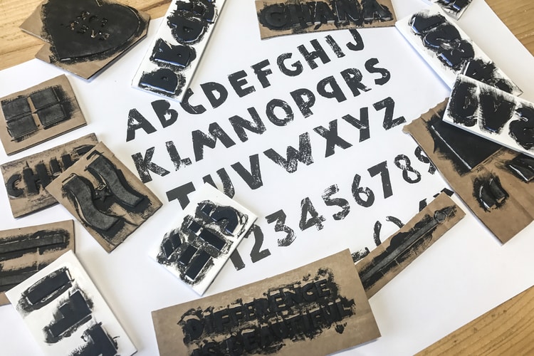Woodcut materials used to create bespoke font and imagery for CHIPS charity brand