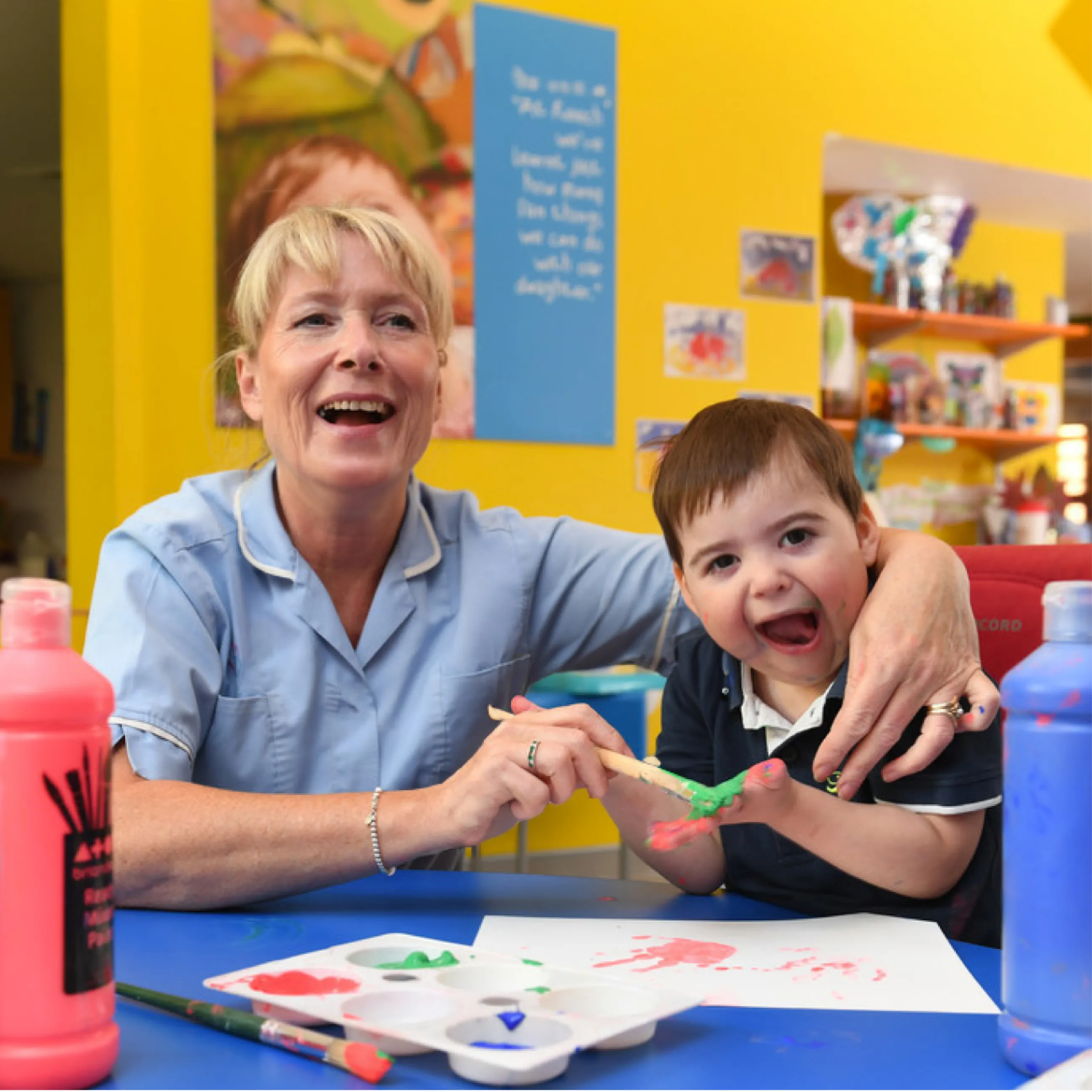 Keech Hospice nurse with a child patient painting