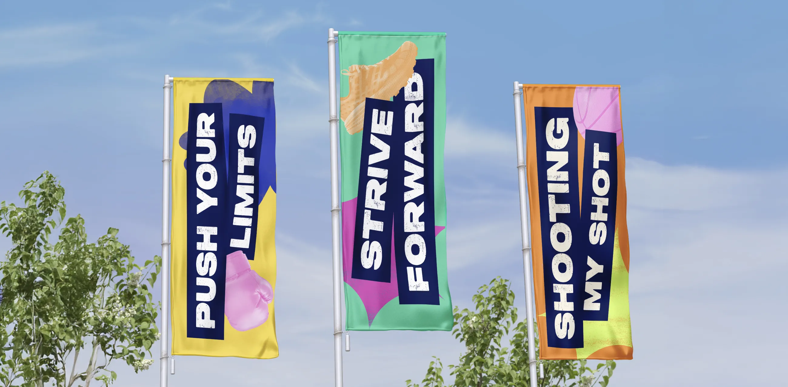 Three flags for StreetGames saying 'Push your limits', 'Strive Forward' and 'Shooting my shot'